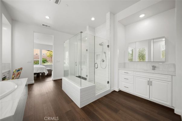 Bathroom, Bedroom, Glass Shower, Interior, Recessed Lighting, Wood Texture Flooring