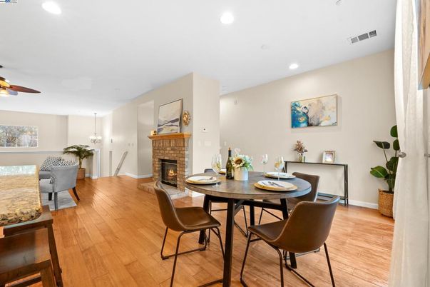Dining room, Fireplace, Interior, Pendant Lights, Recessed Lighting, Wood Texture Flooring