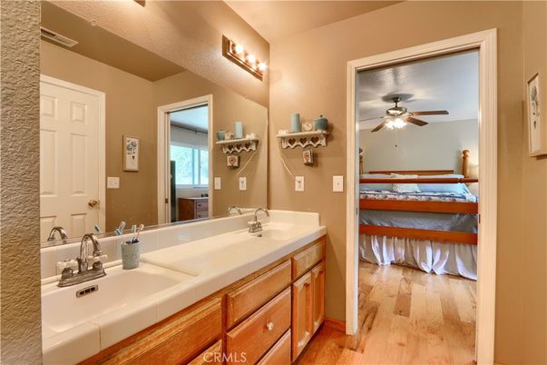 Bathroom, Dual Sink Vanities, Interior, Tile Countertops, Wood Texture Flooring
