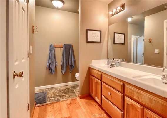 Bathroom, Dual Sink Vanities, Interior, Tile Countertops, Wood Texture Flooring