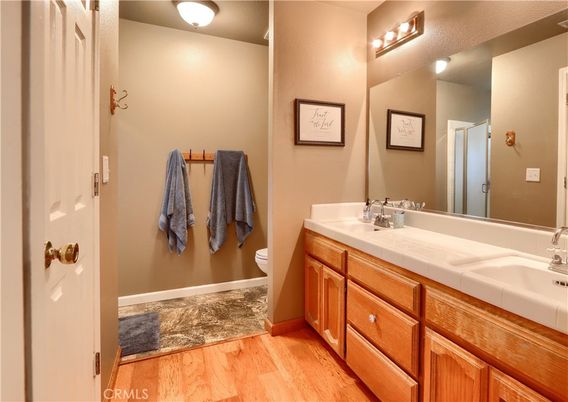 Bathroom, Dual Sink Vanities, Interior, Tile Countertops, Wood Texture Flooring