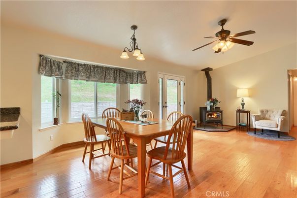 Chandelier, Dining room, Fireplace, Interior, Wood Texture Flooring