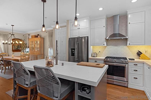Dining room, Interior, Kitchen, Pendant Lights, Recessed Lighting, Stainless Steel Appliances, Wood Texture Flooring