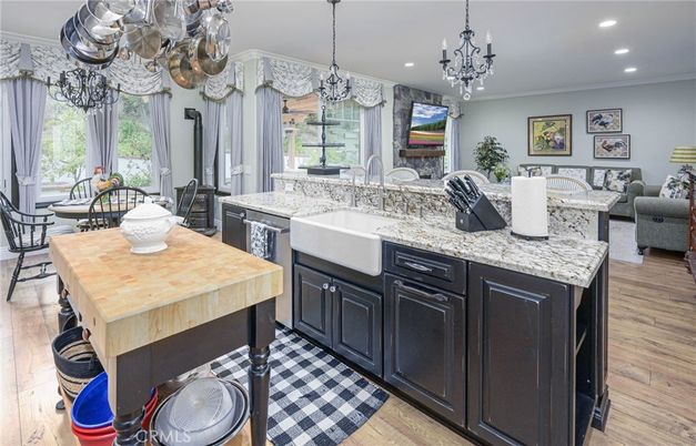 Chandelier, Dining room, Interior, Kitchen, Living room, Recessed Lighting, Wood Texture Flooring