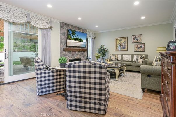 Fireplace, Interior, Living room, Recessed Lighting, Stone Walls, Wood Texture Flooring