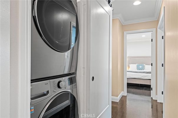 Bedroom, Interior, Recessed Lighting, Utility Closets, Washer, Wood Texture Flooring