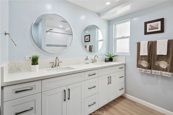 Bathroom, Dual Sink Vanities, Interior, Recessed Lighting, Wood Texture Flooring