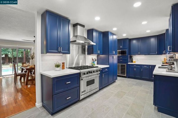 Dining room, Interior, Kitchen, Recessed Lighting, Stainless Steel Appliances, Wood Texture Flooring