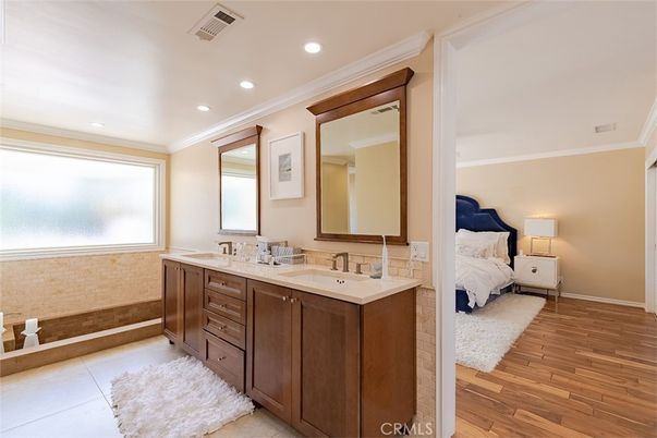 Bathroom, Bedroom, Dual Sink Vanities, Interior, Recessed Lighting, Wood Texture Flooring