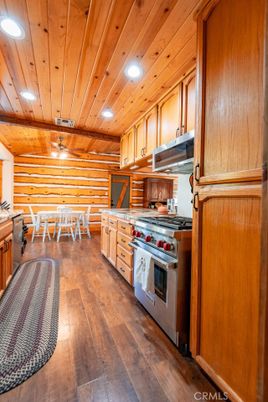 Dining room, Interior, Kitchen, Recessed Lighting, Stainless Steel Appliances, Wooden Ceilings, Wood Texture Flooring, Wooden Walls