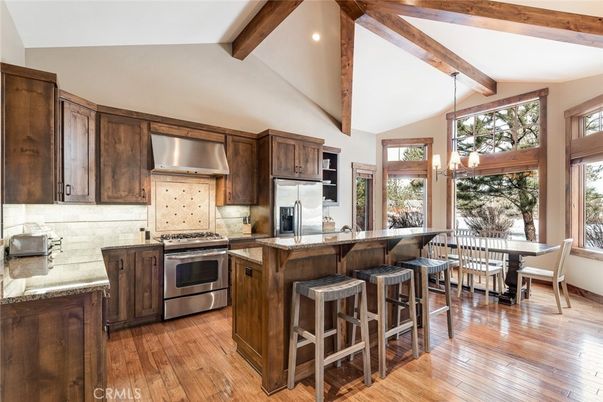 Chandelier, Dining room, Interior, Kitchen, Pendant Lights, Recessed Lighting, Stainless Steel Appliances, Wooden Beams, Wood Texture Flooring