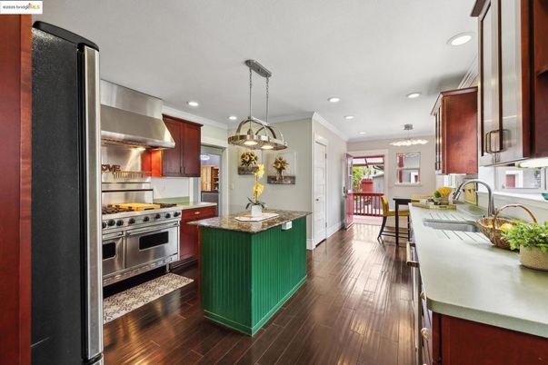 Chandelier, Dining room, Interior, Kitchen, Pendant Lights, Recessed Lighting, Stainless Steel Appliances, Wood Texture Flooring