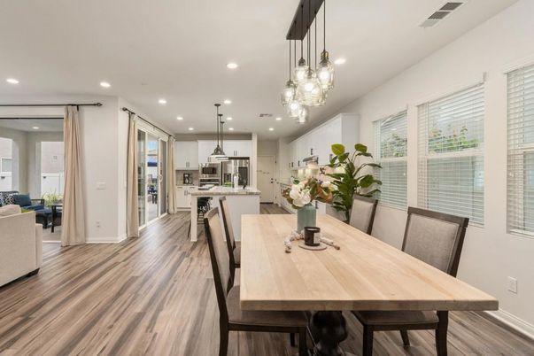 Dining room, Interior, Kitchen, Pendant Lights, Recessed Lighting, Stainless Steel Appliances, Wood Texture Flooring