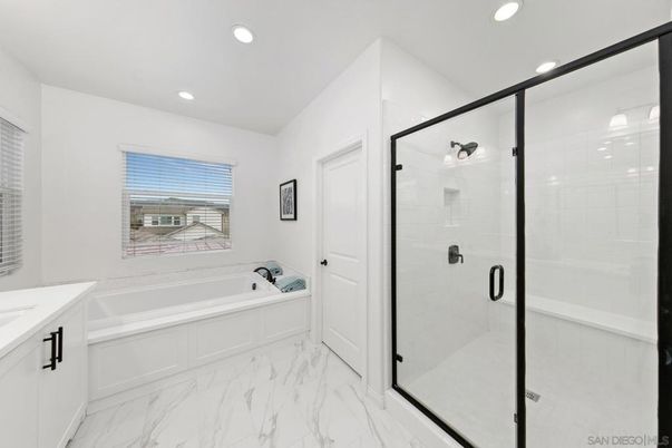 Bathroom, Dual Sink Vanities, Glass Shower, Interior, Marble, Recessed Lighting