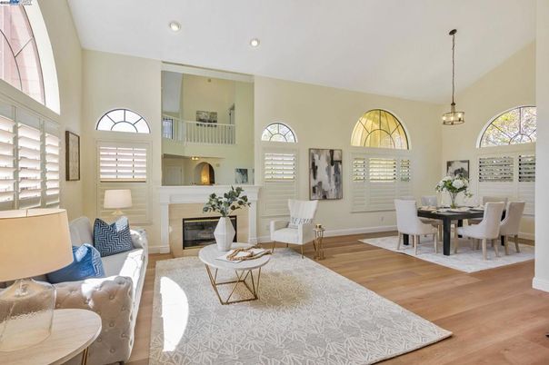 Dining room, Fireplace, Interior, Living room, Pendant Lights, Recessed Lighting, Wood Texture Flooring