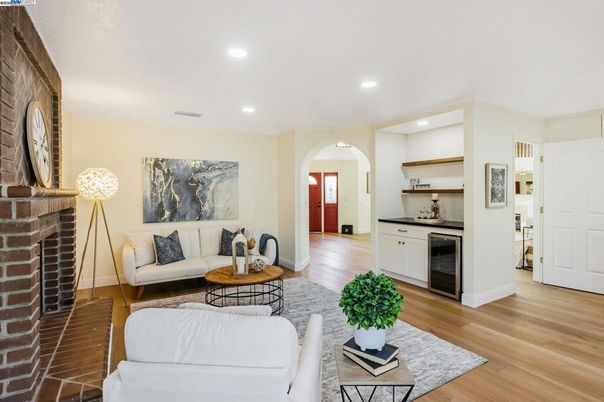 Fireplace, Interior, Living room, Recessed Lighting, Stone Walls, Wood Texture Flooring