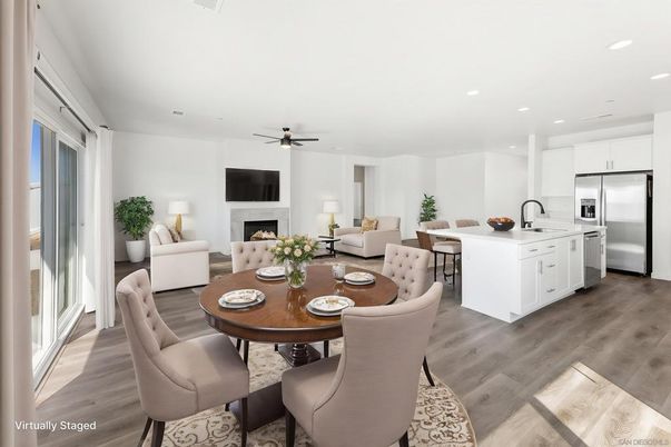 Dining room, Fireplace, Interior, Kitchen, Living room, Recessed Lighting, Stainless Steel Appliances, Wood Texture Flooring
