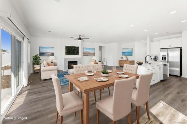Dining room, Fireplace, Interior, Kitchen, Living room, Recessed Lighting, Stainless Steel Appliances, Wood Texture Flooring