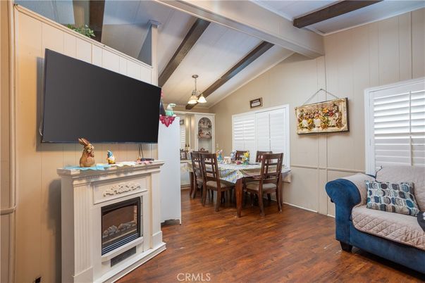Dining room, Fireplace, Interior, Pendant Lights, Wooden Beams, Wood Texture Flooring