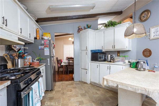 Dining room, Interior, Kitchen, Pendant Lights, Stainless Steel Appliances, Wood Texture Flooring
