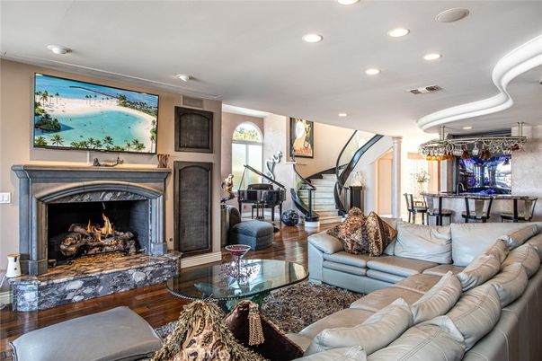 Dining room, Fireplace, Interior, Living room, Piano, Recessed Lighting, Wood Texture Flooring