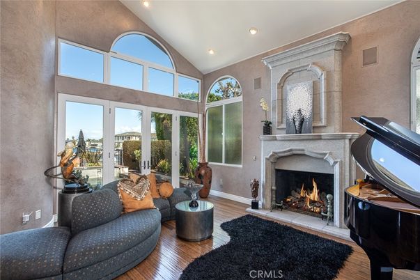 Fireplace, Interior, Living room, Piano, Recessed Lighting, Wood Texture Flooring