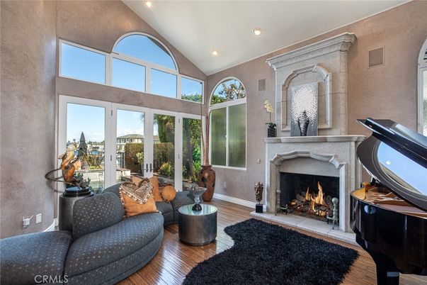 Fireplace, Interior, Living room, Piano, Recessed Lighting, Wood Texture Flooring