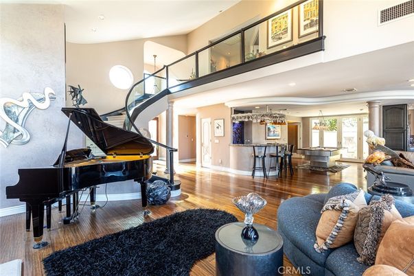 Dining room, Interior, Living room, Pendant Lights, Piano, Recessed Lighting, Wood Texture Flooring