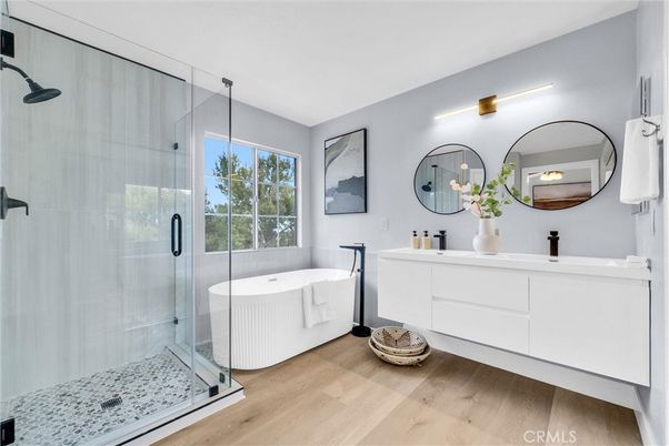 Bathroom, Dual Sink Vanities, Free Standing Baths, Glass Shower, Interior, Wood Texture Flooring
