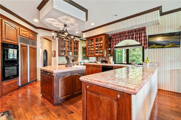 Chandelier, Interior, Kitchen, Recessed Lighting, Tile Countertops, Wood Texture Flooring