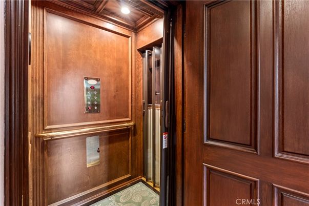 Elevator, Interior, Recessed Lighting, Wooden Ceilings, Wooden Walls