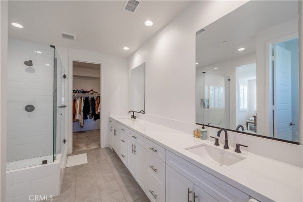 Bathroom, Dual Sink Vanities, Glass Shower, Interior, Recessed Lighting, Walk-in Closets