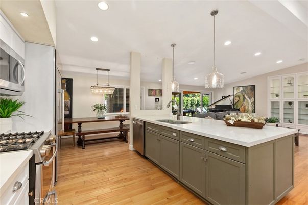 Dining room, Interior, Kitchen, Pendant Lights, Recessed Lighting, Stainless Steel Appliances, Wood Texture Flooring
