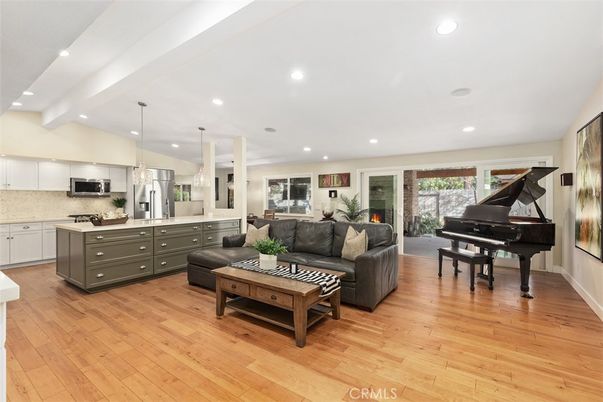 Interior, Kitchen, Living room, Pendant Lights, Piano, Recessed Lighting, Stainless Steel Appliances, Wood Texture Flooring