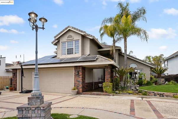 Attached, Exterior, Facade, Brick Facade, Solar Panels, Mediterranean