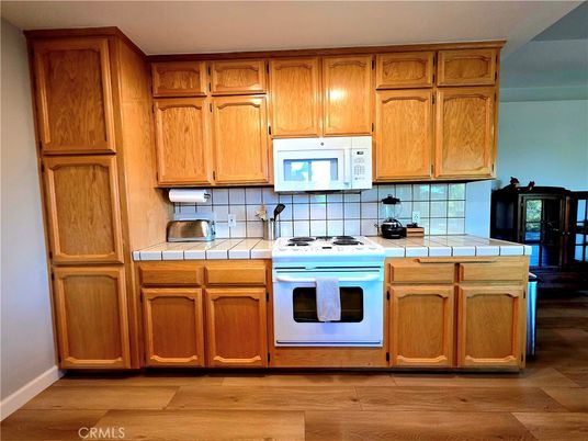 Interior, Kitchen, Tile Countertops, Wood Texture Flooring