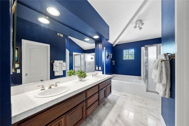 Bathroom, Dual Sink Vanities, Interior, Marble, Recessed Lighting, Tile Countertops