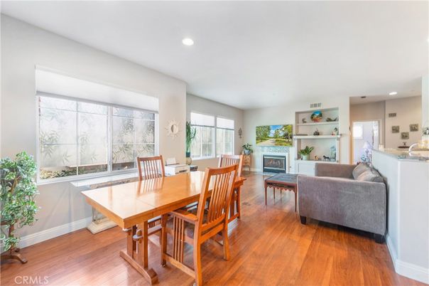 Dining room, Fireplace, Interior, Living room, Recessed Lighting, Wood Texture Flooring