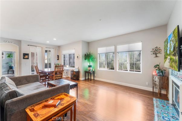 Dining room, Fireplace, Interior, Living room, Recessed Lighting, Wood Texture Flooring