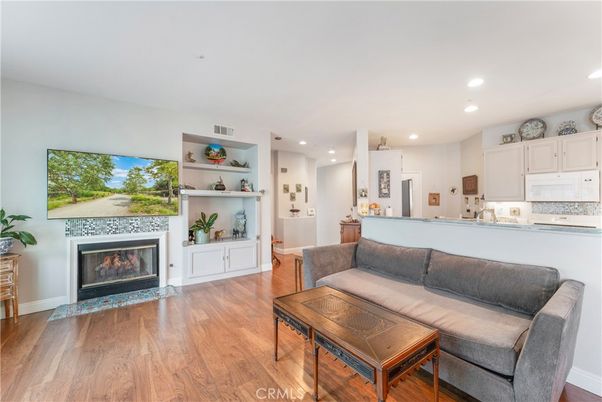 Fireplace, Interior, Kitchen, Living room, Recessed Lighting, Wood Texture Flooring