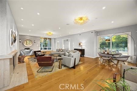 Chandelier, Dining room, Fireplace, Interior, Living room, Recessed Lighting, Wood Texture Flooring