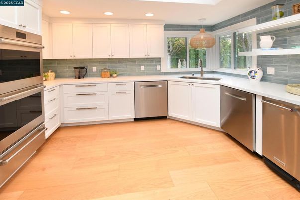 Interior, Kitchen, Recessed Lighting, Stainless Steel Appliances, Wood Texture Flooring