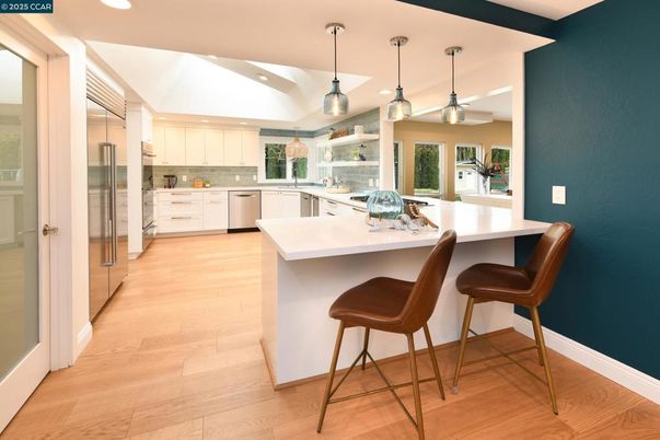 Interior, Kitchen, Pendant Lights, Recessed Lighting, Stainless Steel Appliances, Wood Texture Flooring