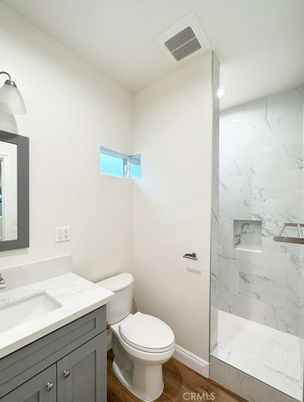 Bathroom, Glass Shower, Interior, Marble Walls, Wood Texture Flooring