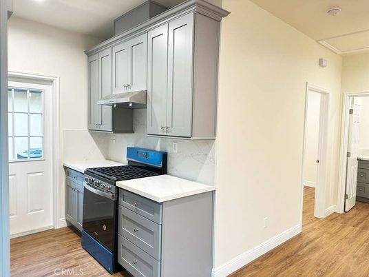 Interior, Kitchen, Marble Walls, Recessed Lighting, Wood Texture Flooring