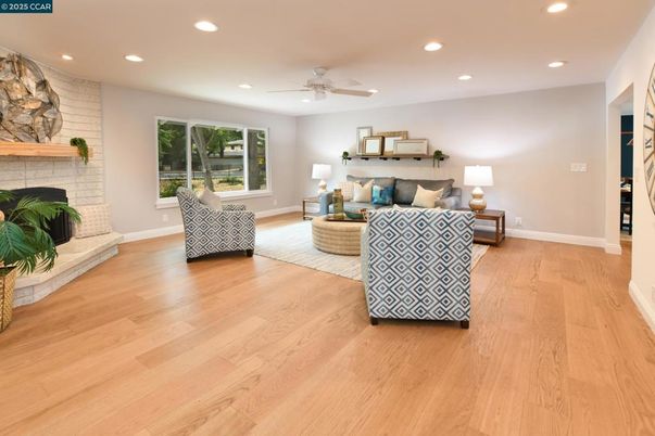 Fireplace, Interior, Living room, Recessed Lighting, Stone Walls, Wood Texture Flooring