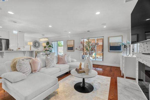 Fireplace, Interior, Kitchen, Living room, Pendant Lights, Recessed Lighting, Stainless Steel Appliances, Wood Texture Flooring