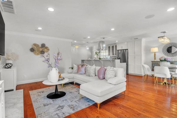 Dining room, Interior, Kitchen, Living room, Recessed Lighting, Stainless Steel Appliances, Wood Texture Flooring