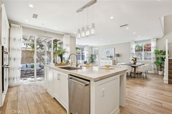 Dining room, Interior, Kitchen, Pendant Lights, Recessed Lighting, Stainless Steel Appliances, Wood Texture Flooring
