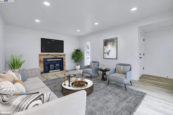 Fireplace, Interior, Living room, Recessed Lighting, Wood Texture Flooring